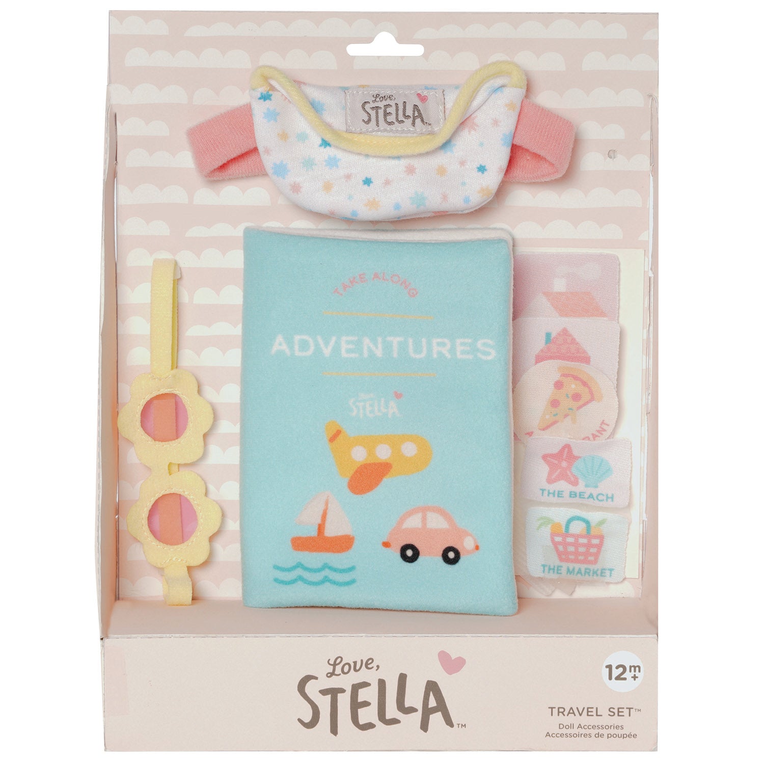 travel themed doll accessory set with doll sized fanny pack and sunglasses show on a soft doll along with a child sized travel book with 6 stamps in open front box packaging