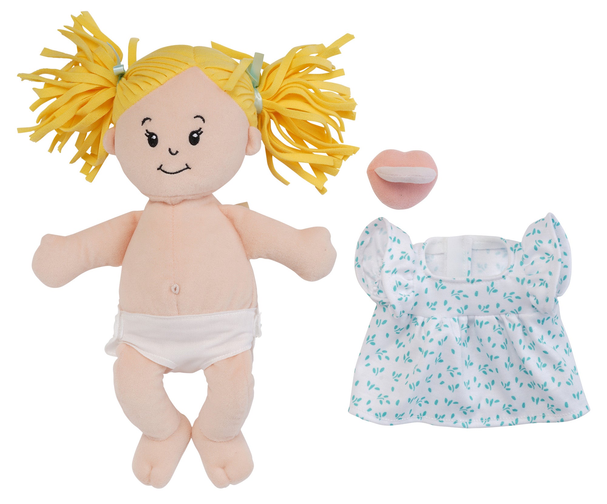Peach doll with blonde pigtails with dress removed and pacifier off to side of doll to show fabric belly button and removable fabric diaper on doll.