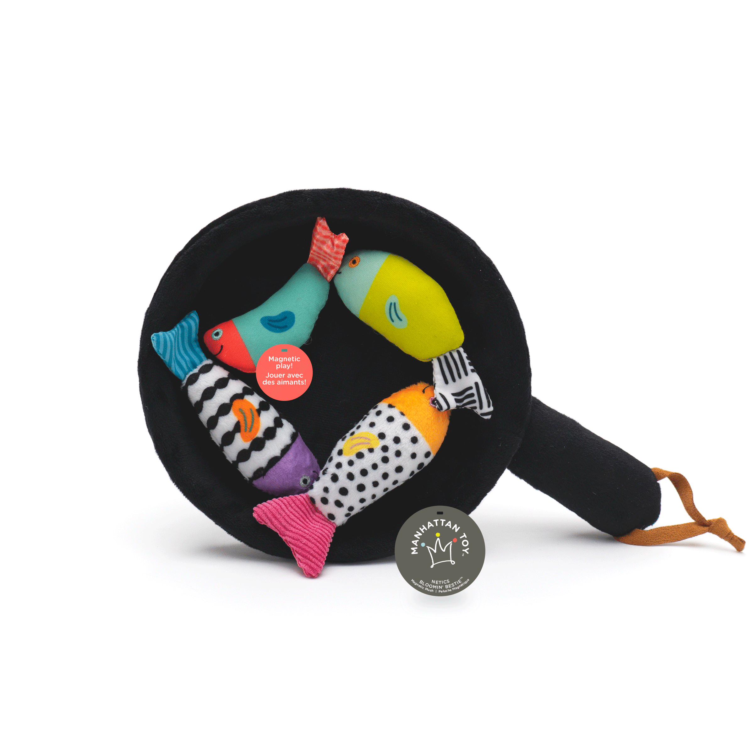 Frying pan toy with colorful magnetic fish inside of it.