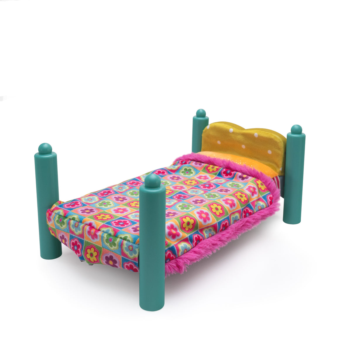 A miniature doll bed with teal posts, a yellow headboard, and a colorful floral blanket covered in pink fringe, shown on a white background.