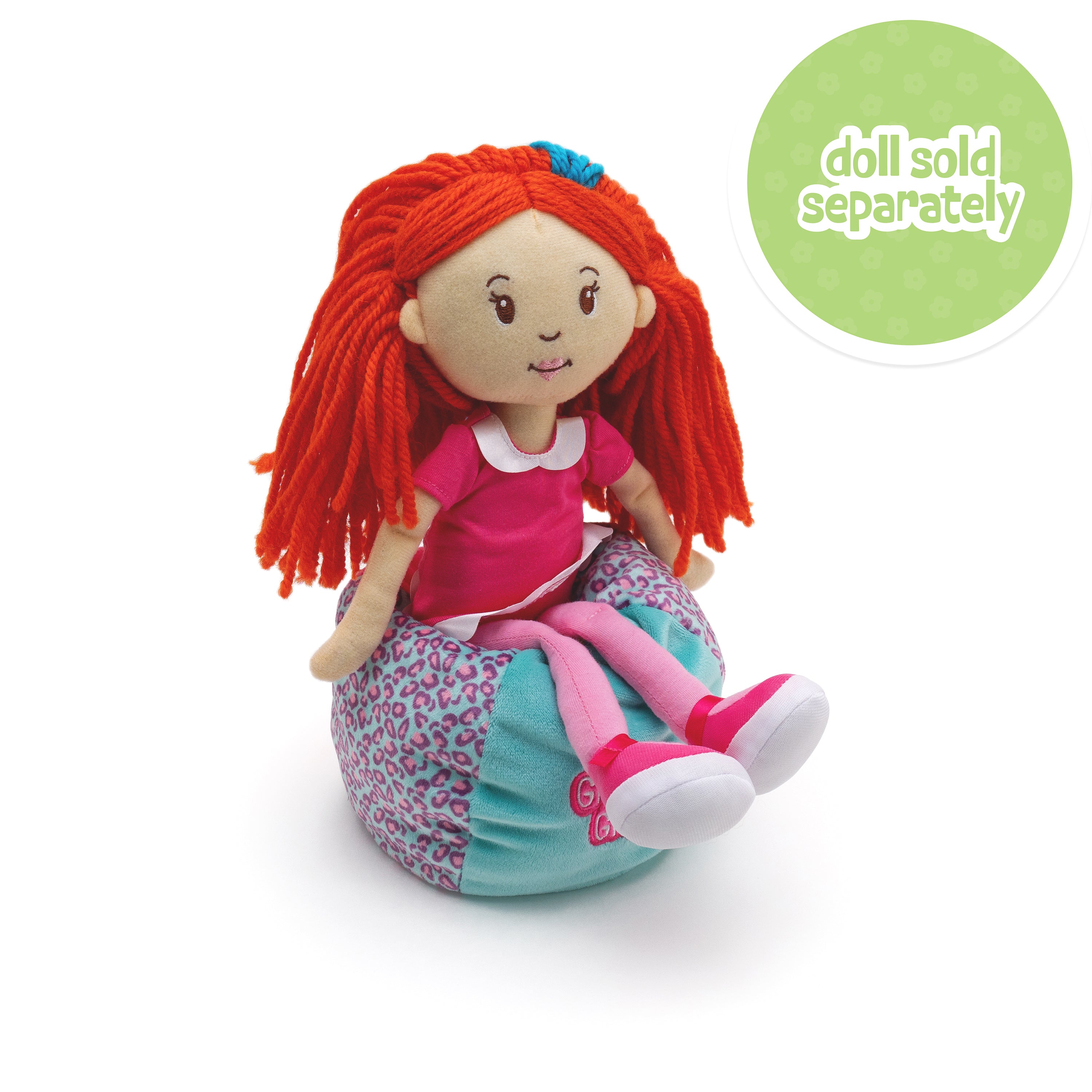 Soft doll sitting on a beanbag chair with blue, pink, and animal print patterned sections. Doll sold separately callout
