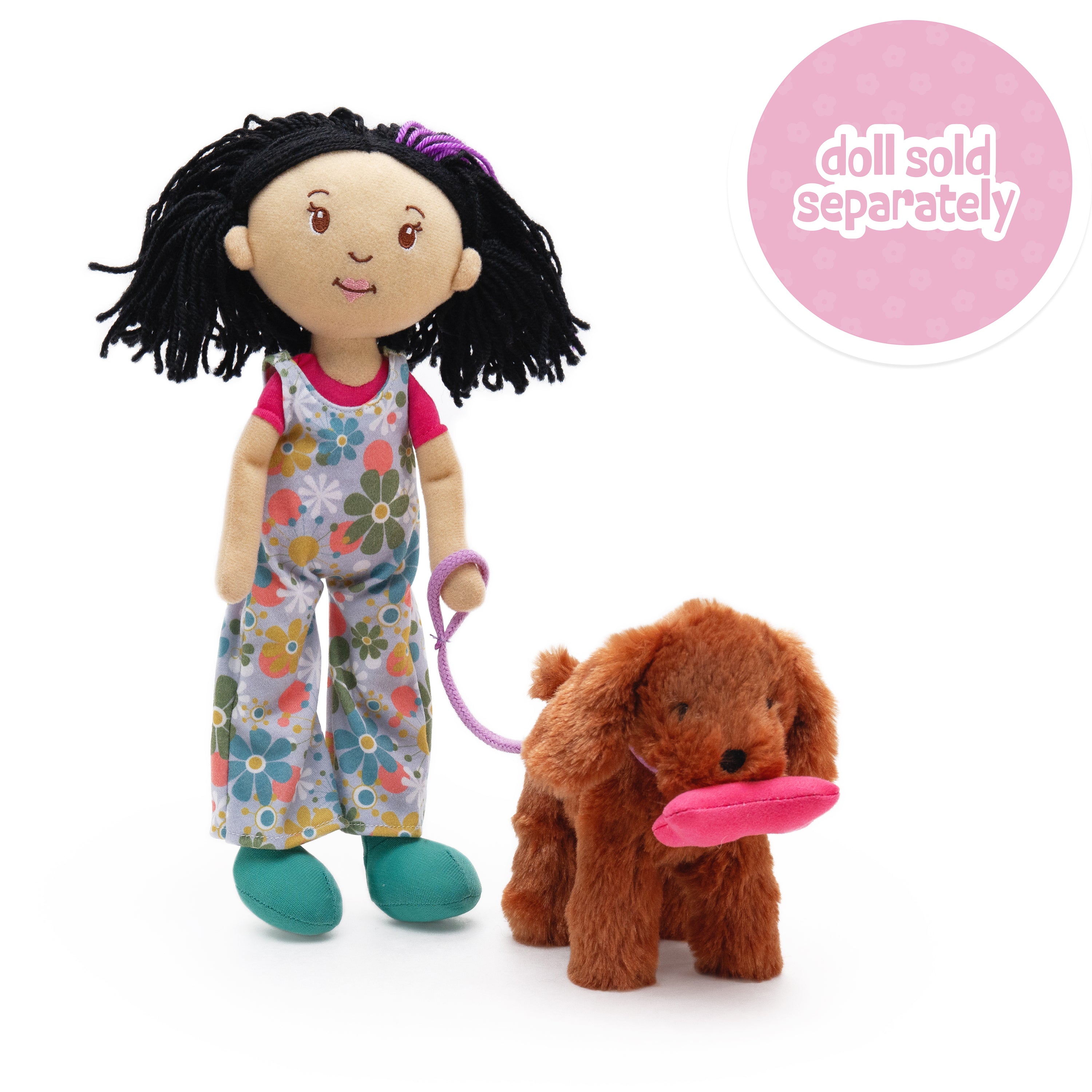 Soft doll holding leash with a soft brown dog holding a magnetic bone in its mouth. Doll sold separately callout