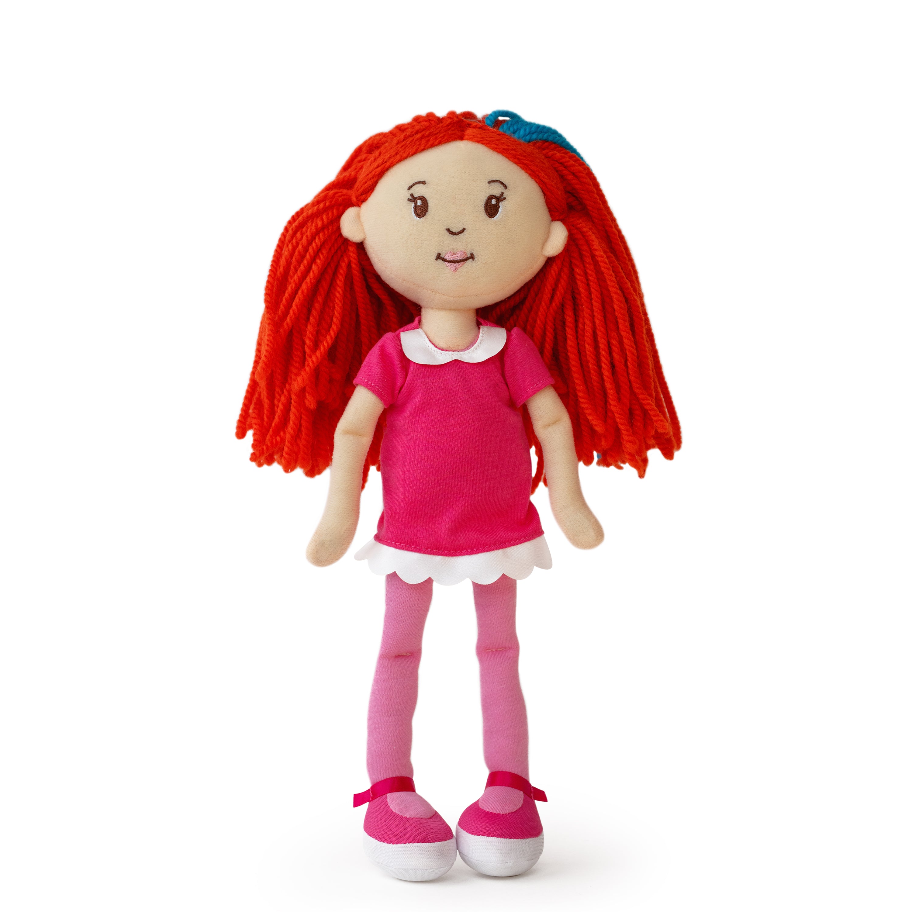 Toy doll with red hair, pink shirt, and skirt on a white background
