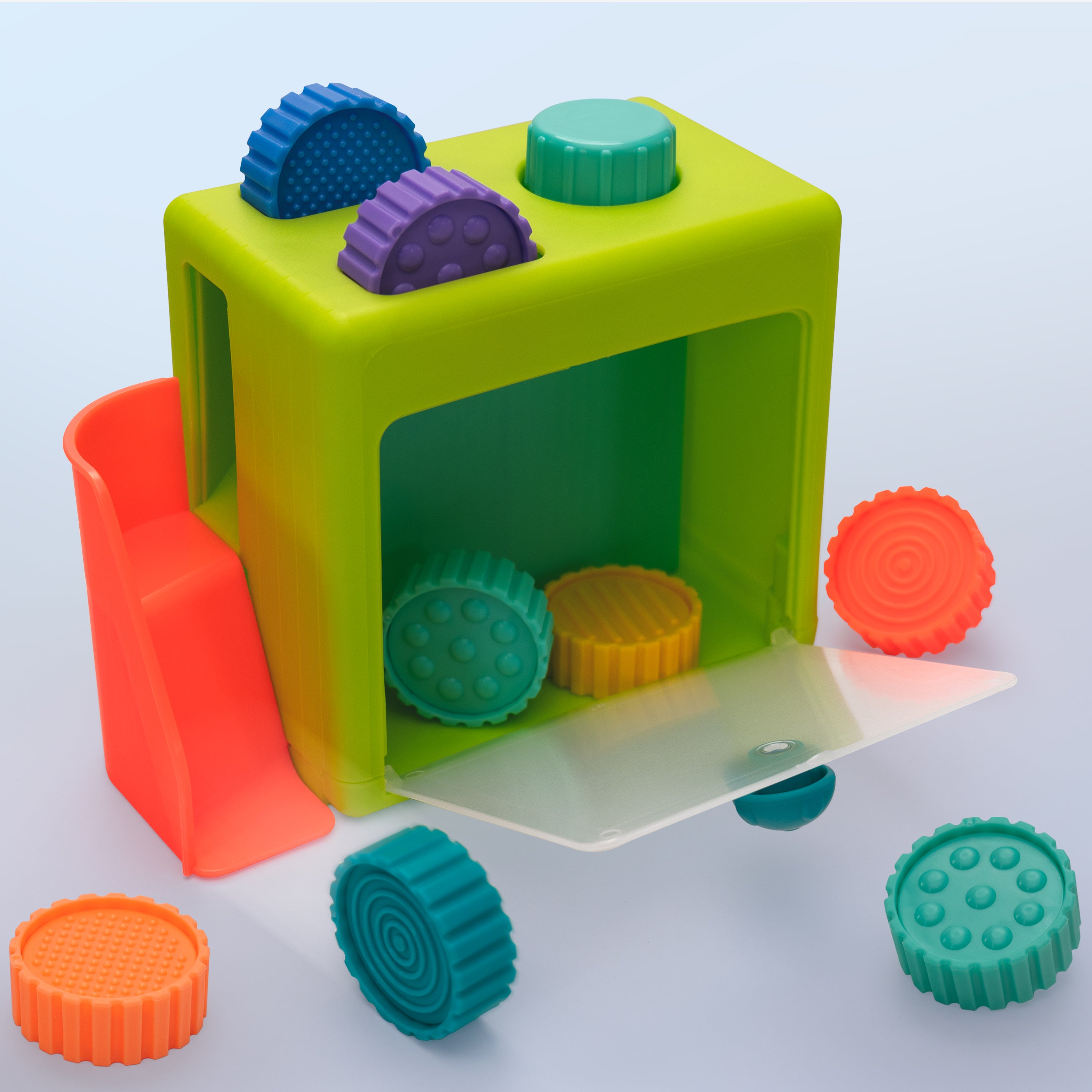 Colorful toy building block set on a light blue background