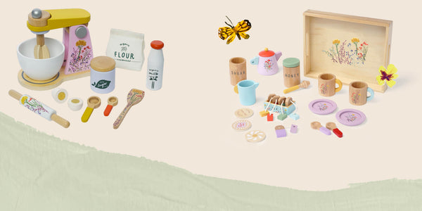Anthropologie mixer set and honey bee toy set on cream background