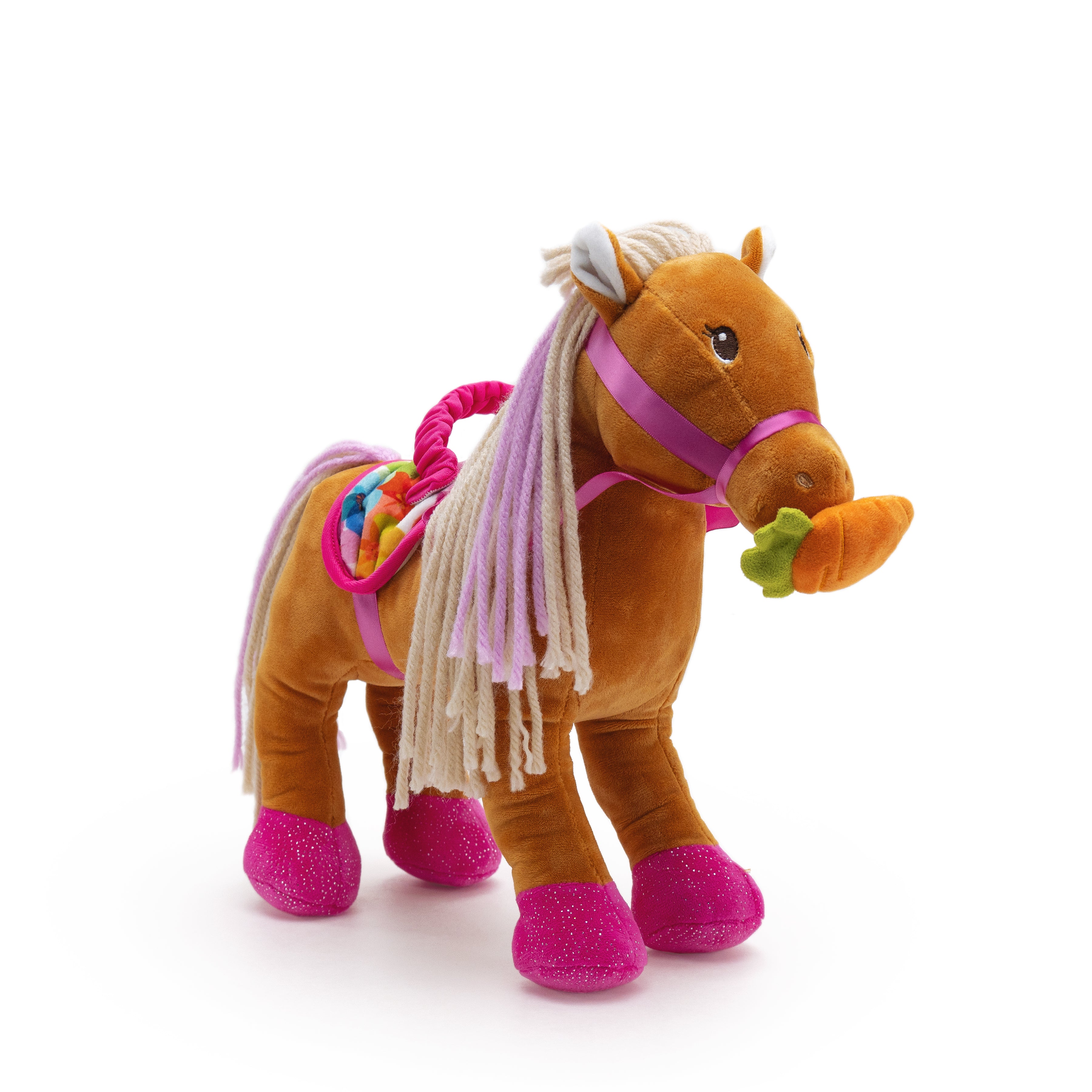 Soft brown horse with pink hooves, multicolored saddle, and a carrot in its mouth.