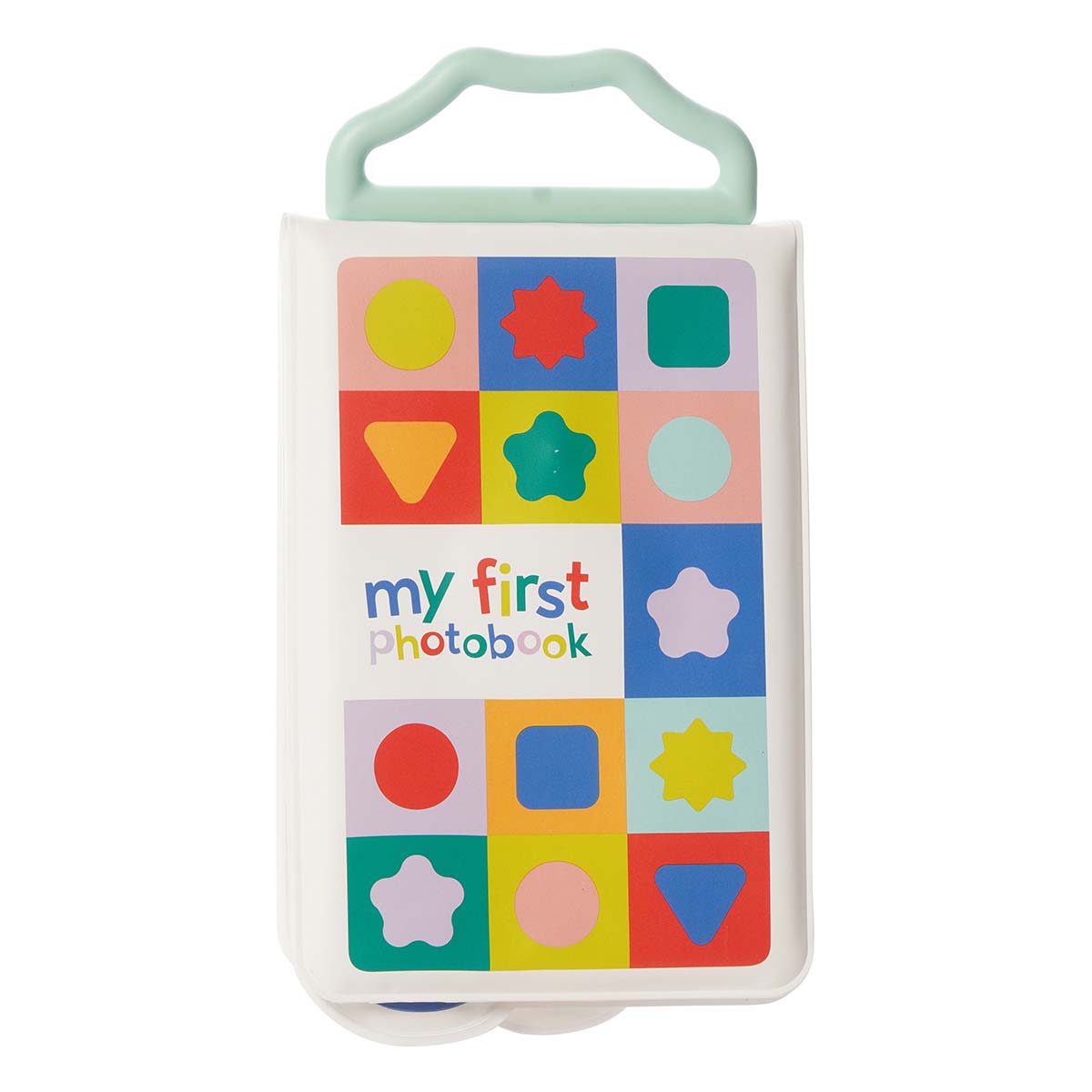 "My First Photobook" written on a white booklet with colorful shapes on the front. A uniquely shaped plastic handle on top.