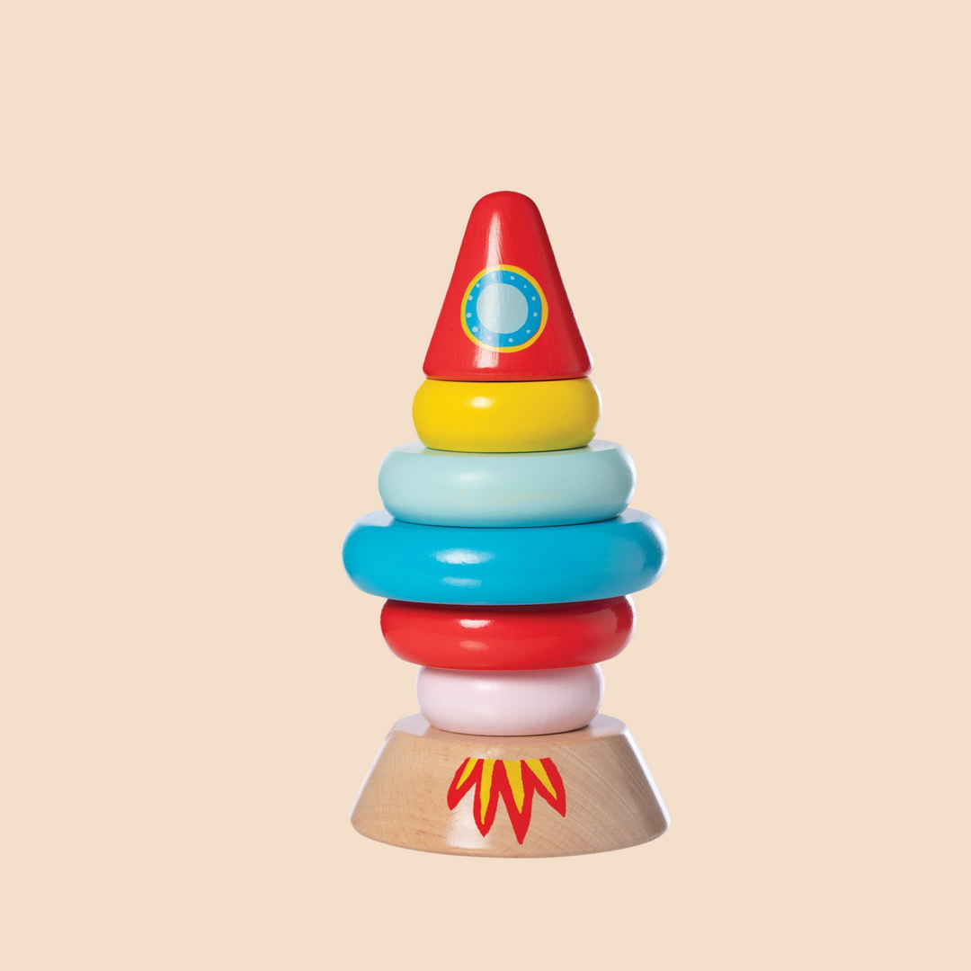 Wood magnetic stacking toy in the shape of a rocket.