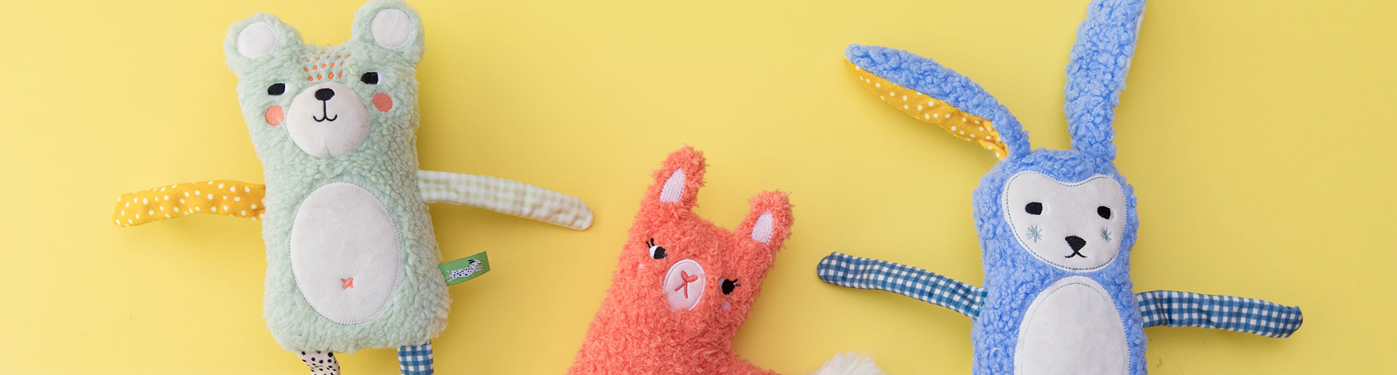 Dog toys on yellow background