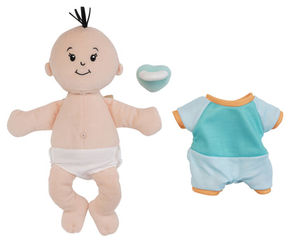 peach skinned soft baby doll with outfit removed and magnetic pacifier off to the side of the doll to show the fabric belly button and removable fabric diaper on the doll.