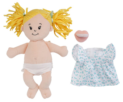 Peach doll with blonde pigtails with dress removed and pacifier off to side of doll to show fabric belly button and removable fabric diaper on doll.