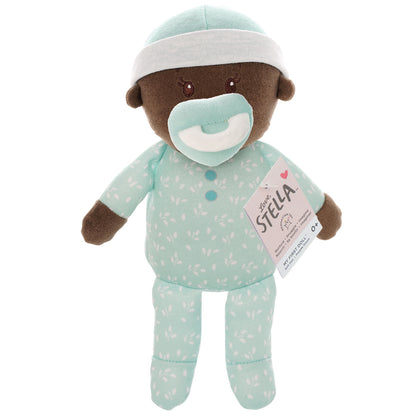 soft baby snuggle doll with brown skin with magnetic pacifier pictured with hang tag packaging