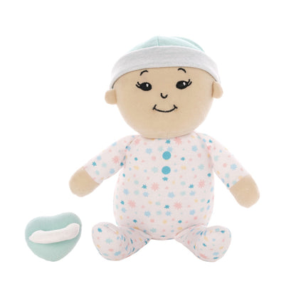 soft baby snuggle doll with beige skin that includes a magnetic pacifier