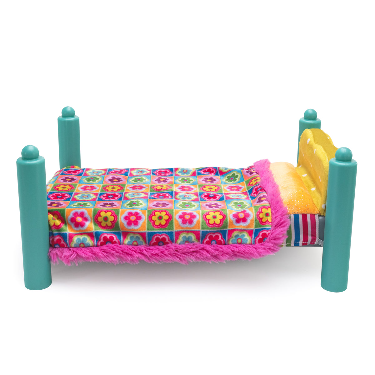 A miniature doll bed with teal posts, a yellow headboard, and a colorful floral blanket covered in pink fringe, shown on a white background.
