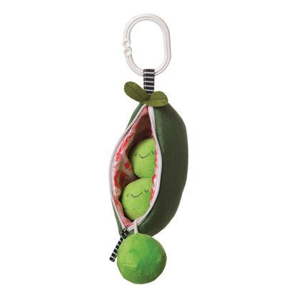 Farmer's market pea pod baby travel toy with three peas nestled inside a pea pod, one of the peas is handing outside of the pod opening.