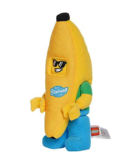 Banana costume plush inspired by LEGO shown in three quarter view with sunglasses face, green shirt, blue pants, and Banana logo.