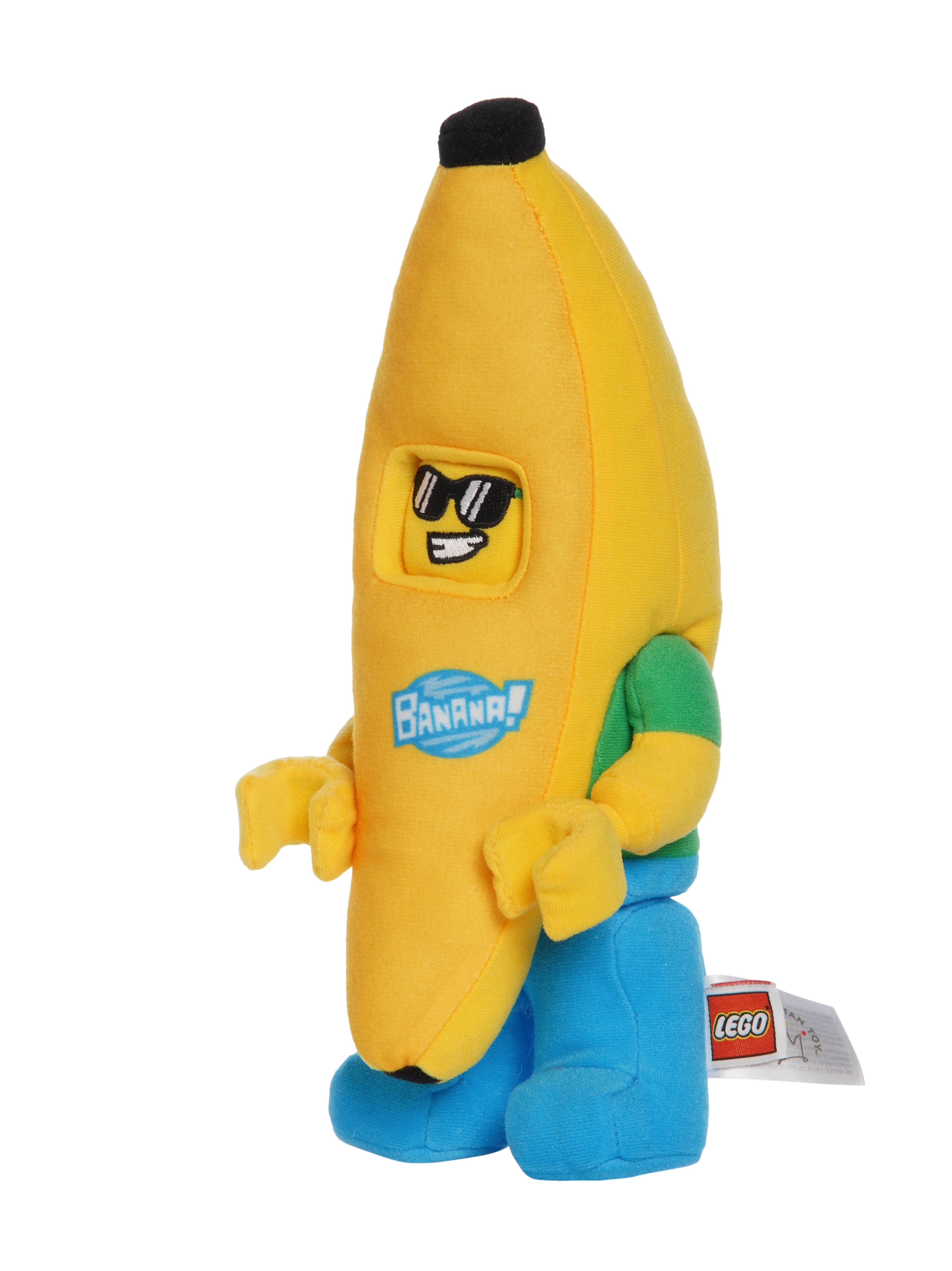 Banana costume plush inspired by LEGO shown in three quarter view with sunglasses face, green shirt, blue pants, and Banana logo.