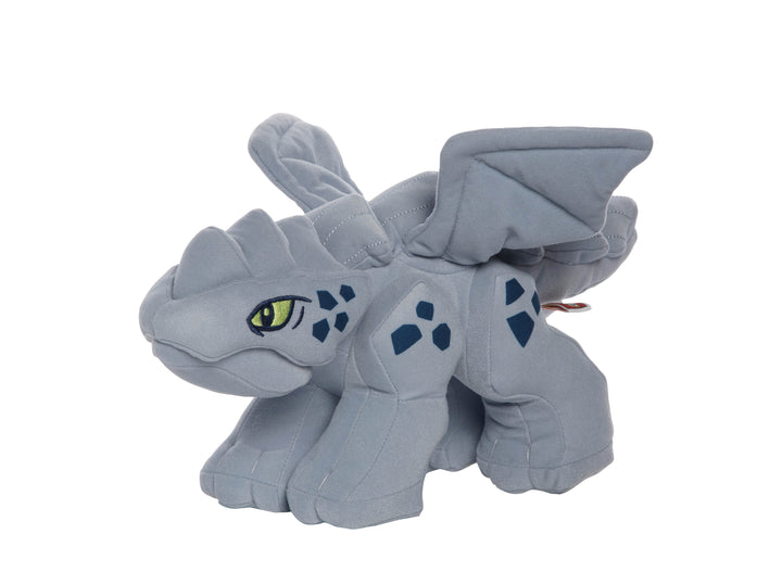 Gray baby dragon plush inspired by LEGO Ninjago with green embroidered eyes, winged back, and dark blue scale patches.