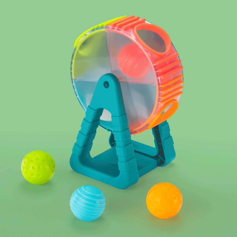 Colorful toy ball launcher with four textured balls in green, blue, orange, and red, displayed against a light green background.