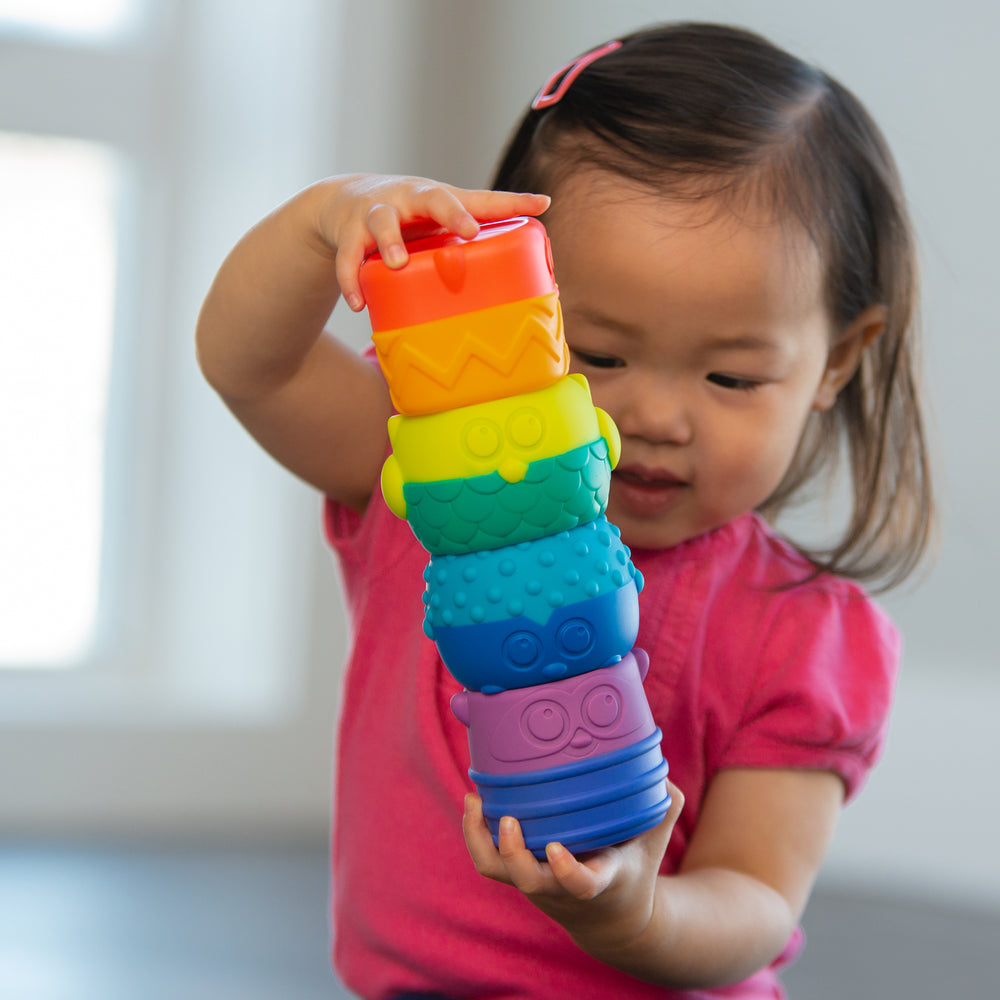 set of three stem toys: shape puzzle, shape sorter and animal stacker