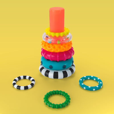 Colorful stack of rings on a yellow background