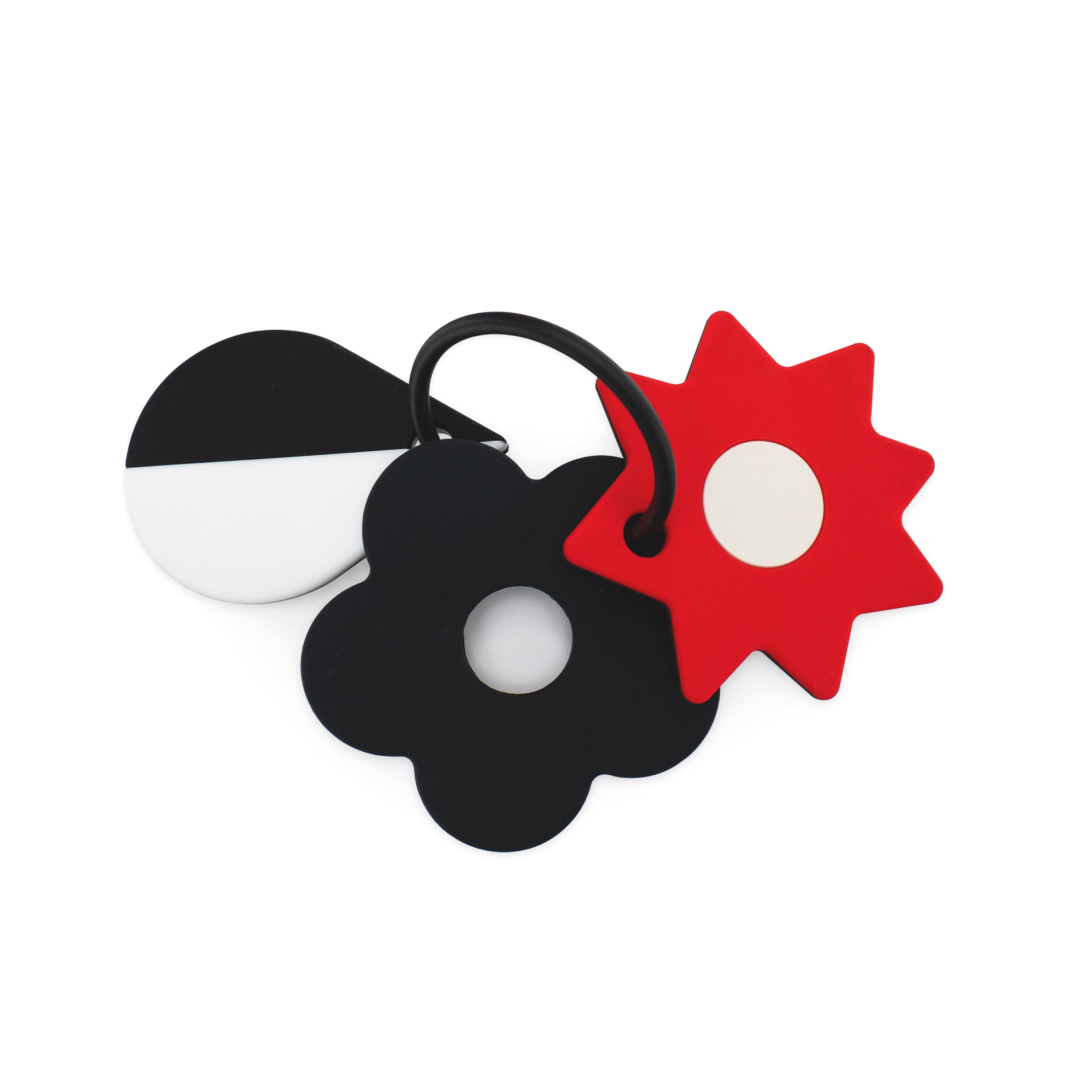 Three colorful flower-shaped keychains on a white background