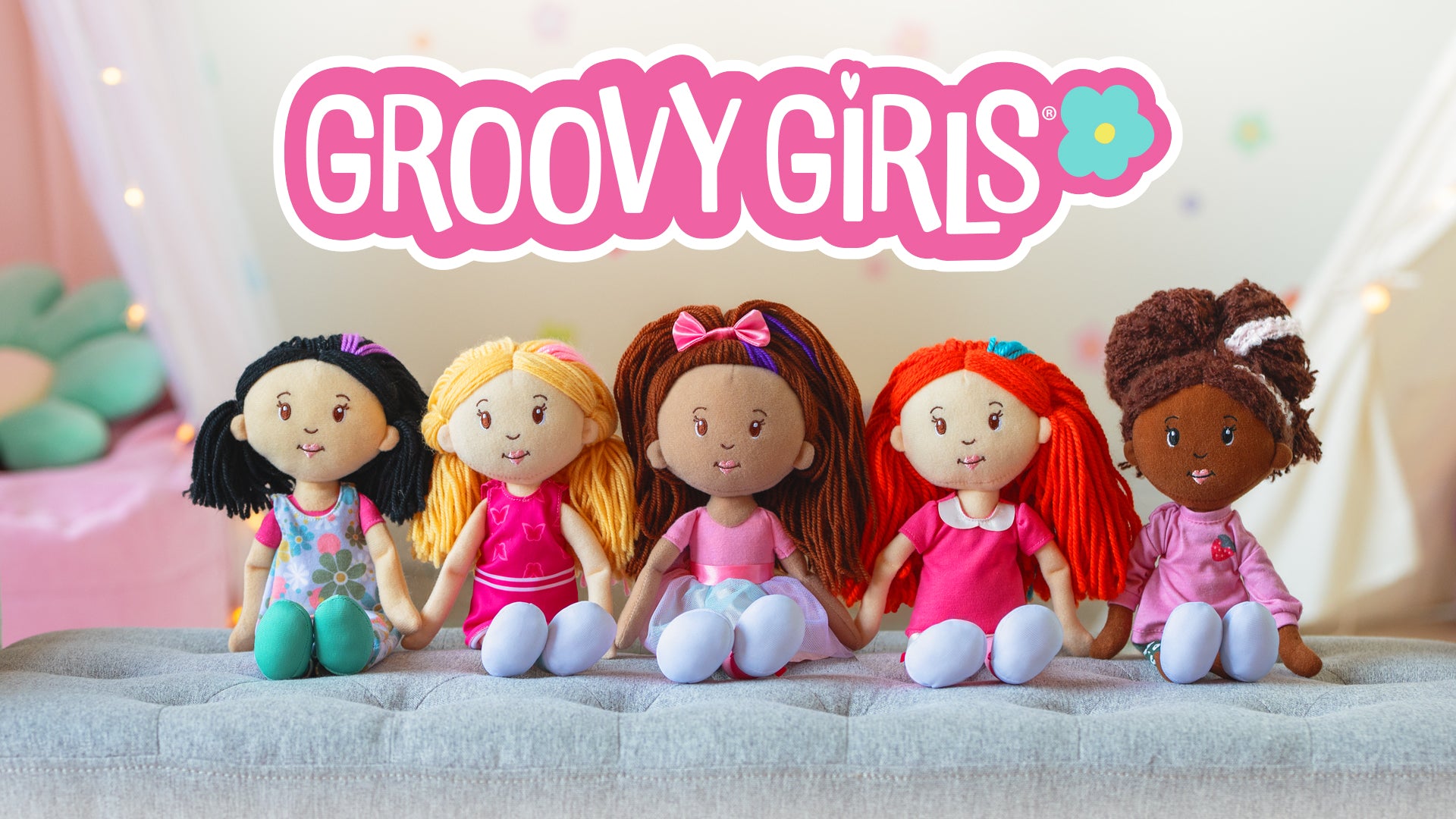 Five dolls with different hairstyles and outfits on a light surface, with 'Groovy Girls' text above.