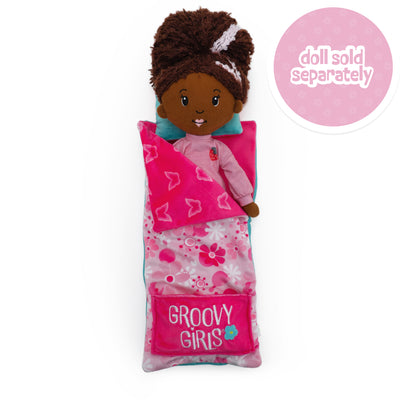 Pink sleeping bag with a doll inside, labeled 'Groovy Girls', on a white background. Doll sold separately callout