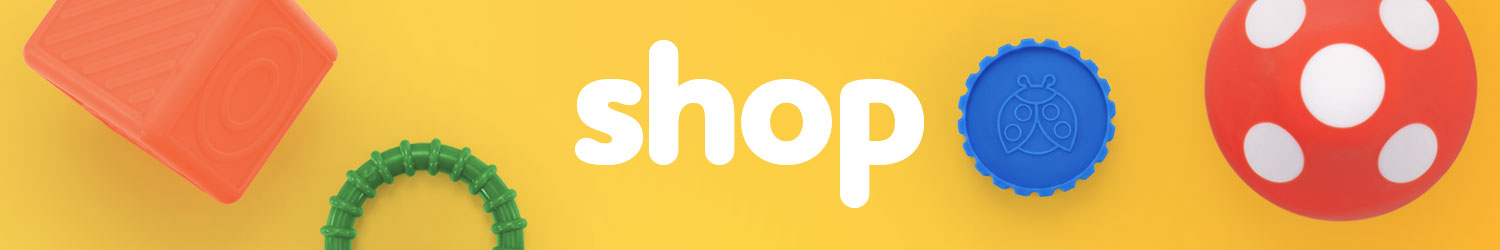 Bright yellow banner with colorful textured toy shapes and the word 'shop' in bold white letters. Desktop Version