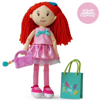 soft doll wearing pink shirt with blue bow, pink skirt, cloth purse, and paper gift bag.