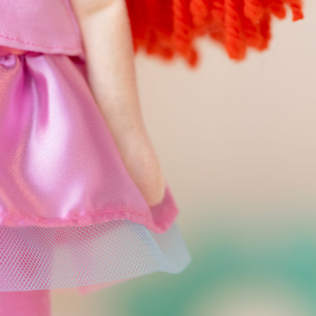 close up of pink doll skirt with tulle edges