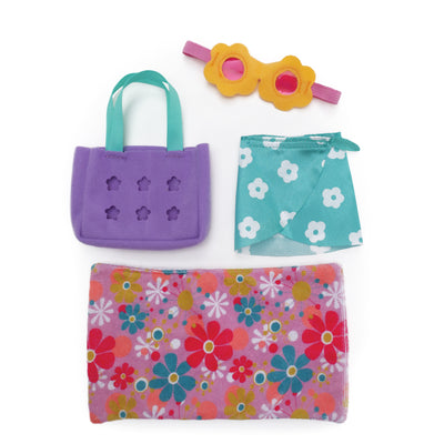 Blue floral doll wrap skirt, floral towel, purple bag, and flower goggles.
