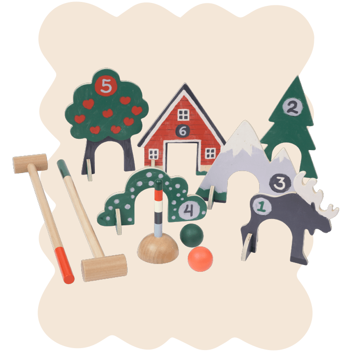 Through The Woods Croquet Set on peach colored cloud background shape