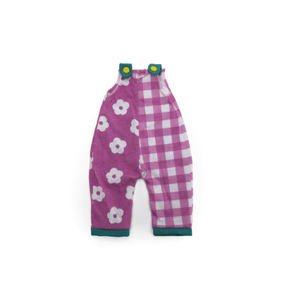 Purple and white doll overalls with floral pattern on one side and gingham pattern on the other. 
