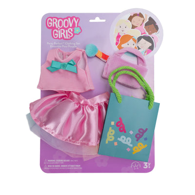 Pink doll shirt with blue bow, pink skirt, cloth purse, and paper gift bag in packaging.