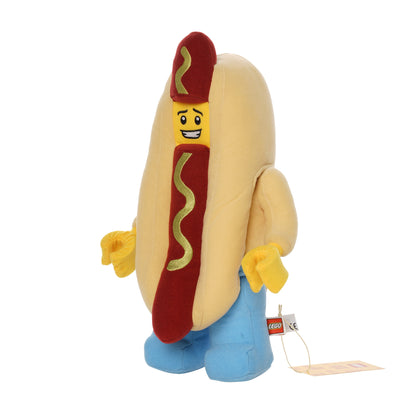 Hot dog costume plush inspired by LEGO with smiling yellow face, red hot dog center, and light blue legs.