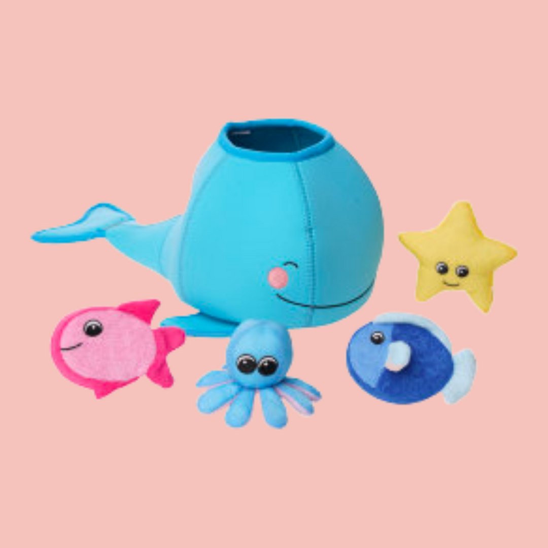 Bath toy is a blue whale and includes 4 smaller bath toys to put inside.