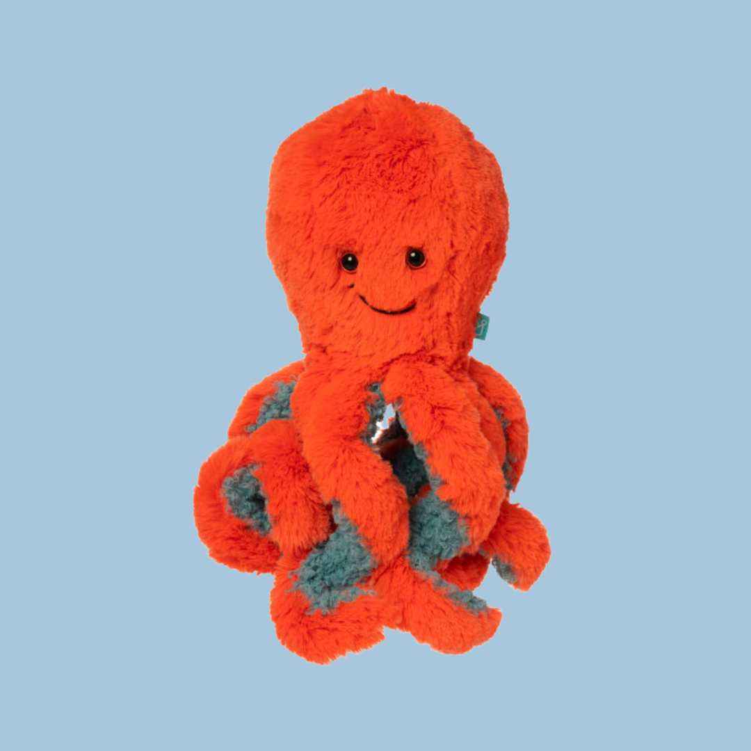 Octopus Plush in a rich coral color.