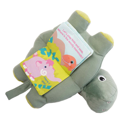 Plush green dinosaur's belly opens up to reveal a baby book with vibrant colored soft crinkle pages.