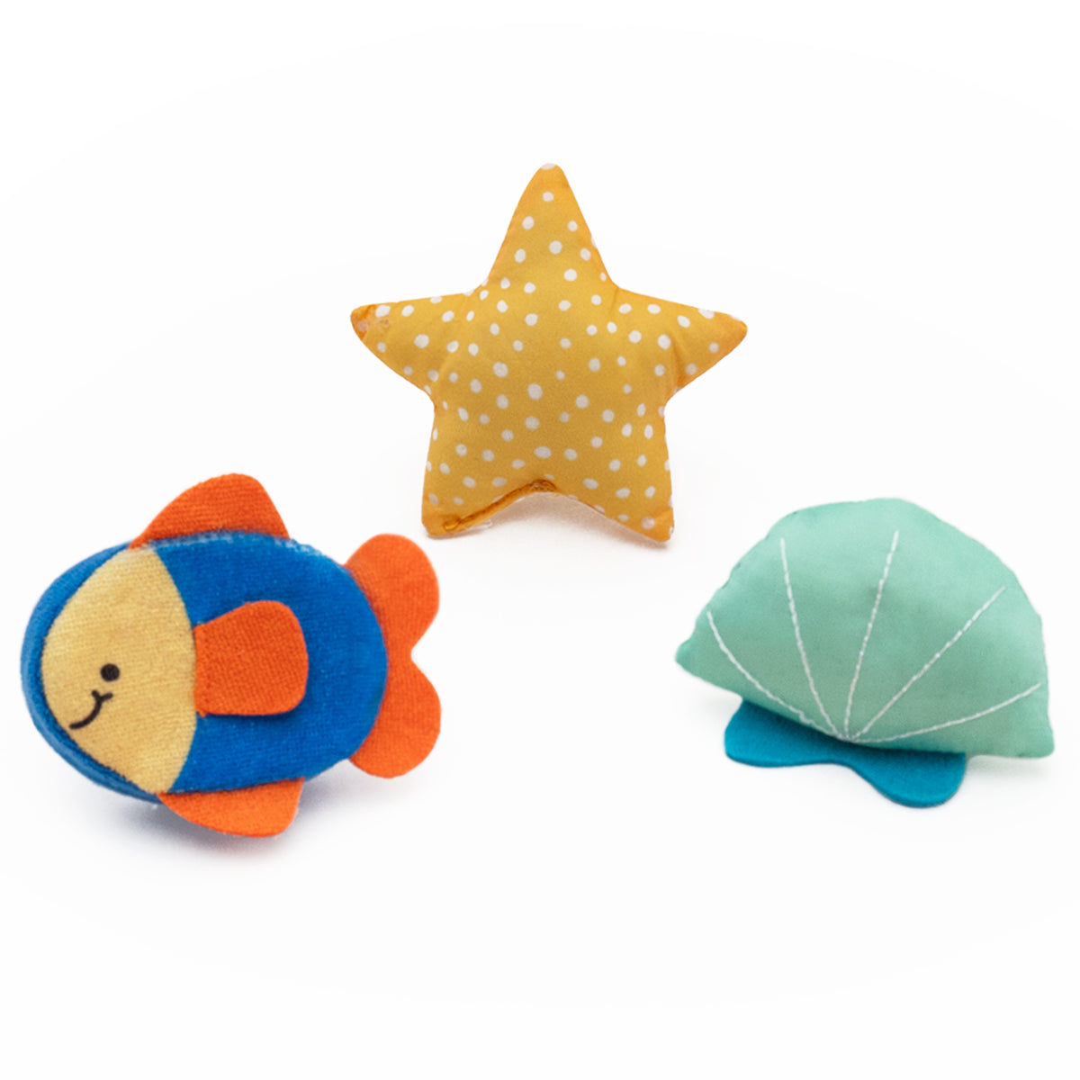 blue fish, yellow starfish, and teal shell bath toys