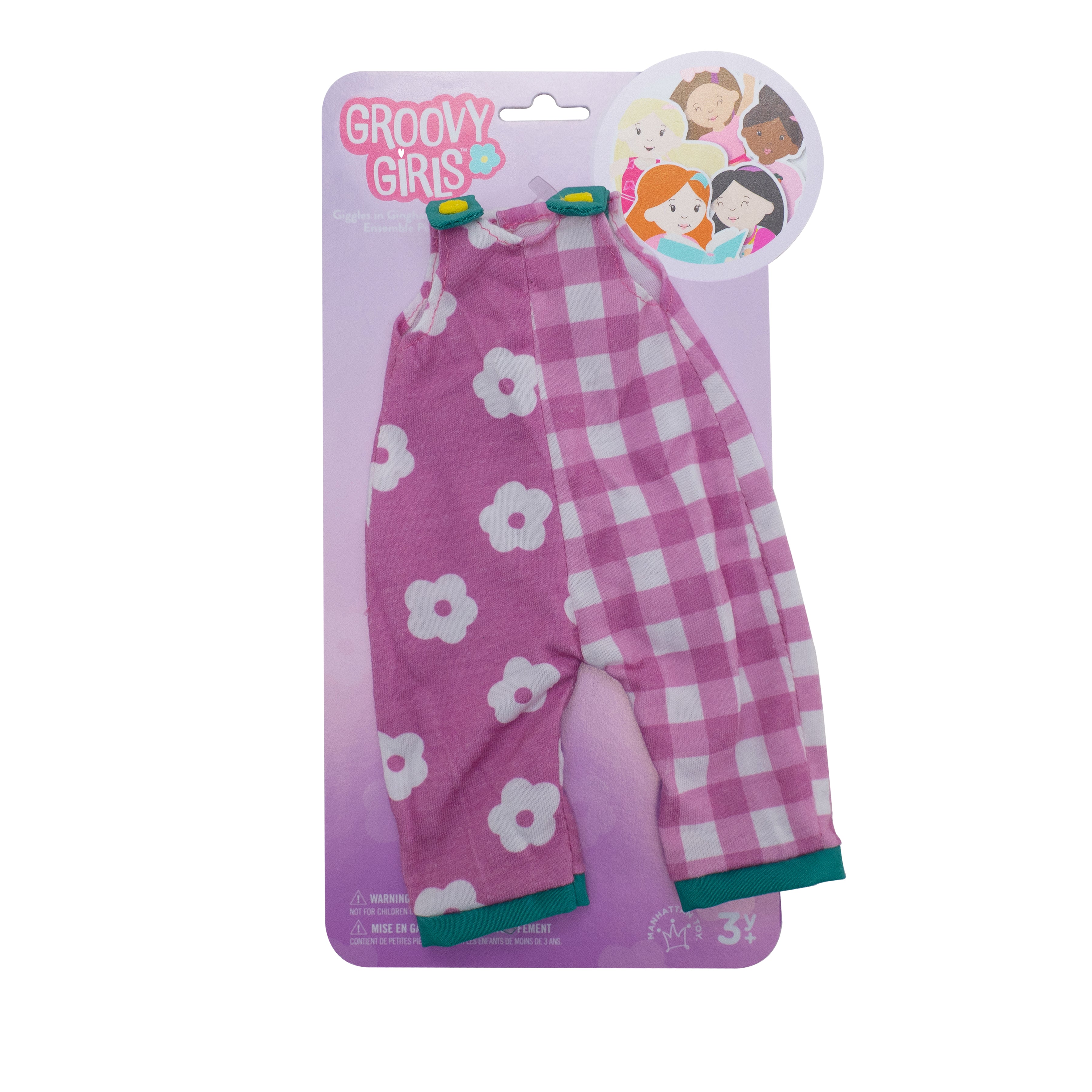 Purple and white doll overalls with floral pattern on one side and gingham pattern on the other in packaging.