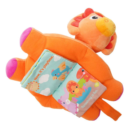 Plush orange dinosaur's belly opens up to reveal a baby book with vibrant colored soft crinkle pages.