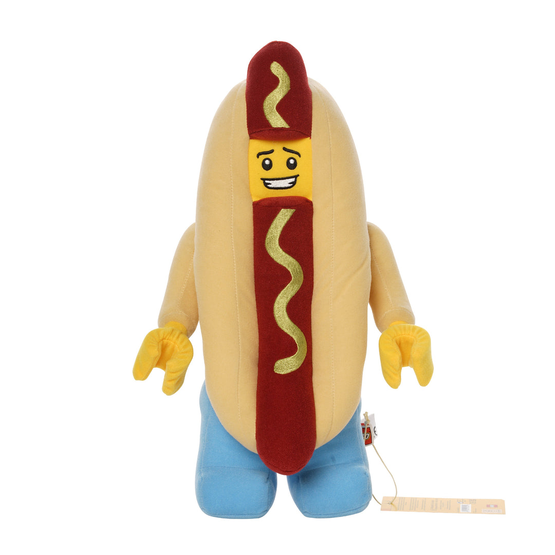 Hot dog costume plush inspired by LEGO with smiling yellow face, red hot dog center, and light blue legs.