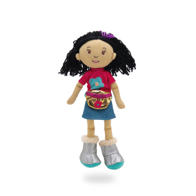 Soft doll wearing pink shirt with blue flower, denim skirt, silver boots, and gold waist bag.
