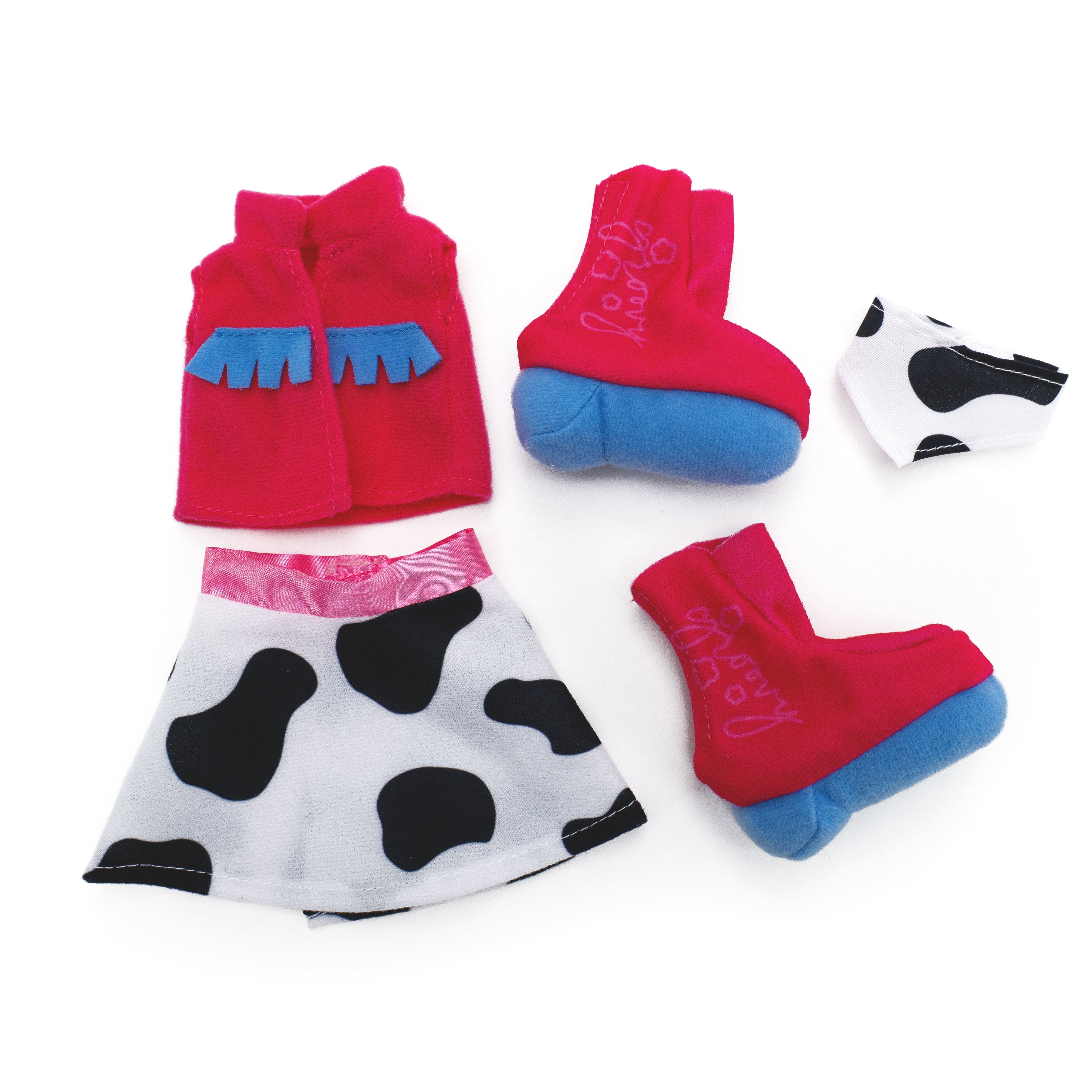 Pink doll vest with cow-print skirt, pink cowgirl boots, and a bandana.